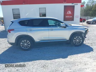 2019 Hyundai Santa Fe SE with VIN 5NMS2CAD4KH109117, listed as a IAAI auction lot 41591901 with 133,338 mi miles. Bid and sale history available at carsss.com. Image 13.