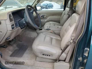 1996 GMC Yukon with VIN 1GKEK13R6TJ747606, listed as a Copart auction lot 80763434 with 308,837 mi miles and Salvage Title. Bid and sale history available at carsss.com. Image 7.