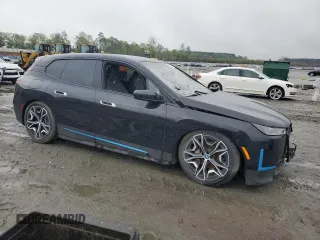 2023 BMW iX xDrive50 z VIN WB523CF00PCL83127, wystawiony jako Copart lot #49927914 z przebiegiem Nie podano mil oraz . Historia ofert i sprzedaży dostępna na DreamBid. Obrazek 4.