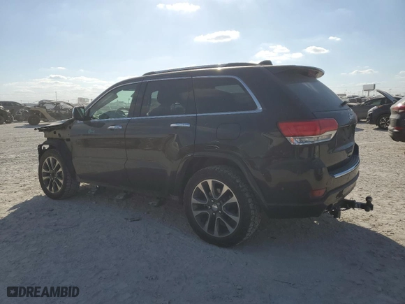 2017 Jeep Grand Cherokee Overland with VIN 1C4RJECG2HC614746, listed as a Copart auction lot 77362304 with 86,330 mi miles and Salvage Title. Bid and sale history available at carsss.com. Image 2.