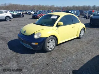 1999 Volkswagen New Beetle GLS with VIN 3VWCC21C1XM415115, listed as a IAAI auction lot 41933992 with 193,653 mi miles. Bid and sale history available at carsss.com. Image 2.