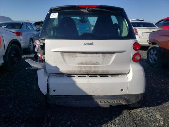 2015 Smart fortwo Passion z VIN WMEEJ3BA5FK817411, wystawiony jako Copart lot #51834455 z przebiegiem 63 143 mil mil oraz Szkody całkowita. Historia ofert i sprzedaży dostępna na DreamBid. Obrazek 6.