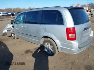 2010 Chrysler Town & Country Touring with VIN 2A4RR5D14AR359169, listed as a IAAI auction lot 41900856 with 204,595 mi miles and . Bid and sale history available at DreamBid. Image 3.
