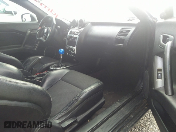 2008 Hyundai Tiburon GT z VIN KMHHN66F58U262230, wystawiony jako IAAI lot #33619963 z przebiegiem 150 708 mil mil oraz . Historia ofert i sprzedaży dostępna na DreamBid. Obrazek 5.