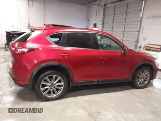 2020 Mazda CX-5 Grand Touring with VIN JM3KFBDM1L1809951, listed as a IAAI auction lot 41345854 with 117,376 mi miles. Bid and sale history available at carsss.com. Image 14.