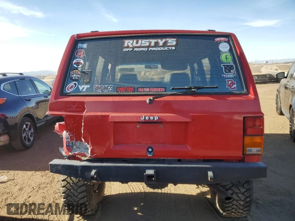 1994 Jeep Cherokee SE with VIN 1J4FJ28S7RL254870, listed as a Copart auction lot 85783884 with 268,569 mi miles and Salvage Title. Bid and sale history available at carsss.com. Image 6.