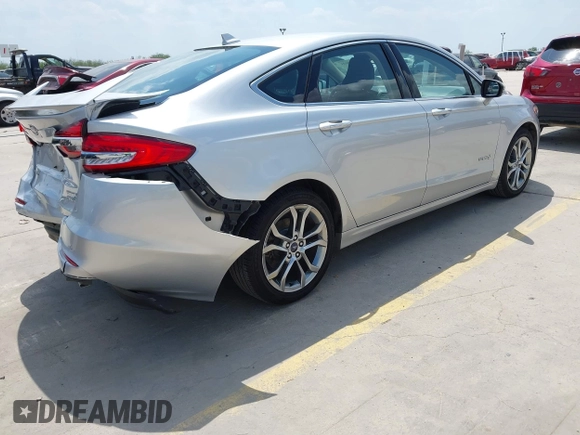 2019 Ford Fusion Titanium with VIN 3FA6P0RUXKR106430, listed as a IAAI auction lot 42329931 with 73,259 mi miles and . Bid and sale history available at DreamBid. Image 4.