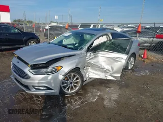 2017 Ford Fusion SE z VIN 3FA6P0HD4HR118826, wystawiony jako IAAI lot #40743513 z przebiegiem 130 038 mil mil oraz . Historia ofert i sprzedaży dostępna na DreamBid. Obrazek 2.