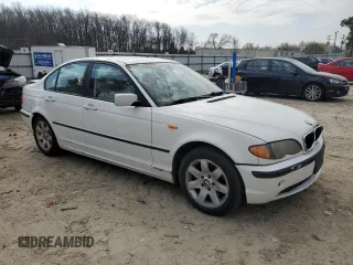 2004 BMW 3 Series 325xi with VIN WBAEU334X4PR14034, listed as a Copart auction lot 50216665 with 93,387 mi miles and Salvage title. Bid and sale history available at DreamBid. Image 4.