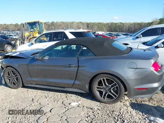 2021 Ford Mustang EcoBoost z VIN 1FATP8UH3M5105279, wystawiony jako IAAI lot #41712821 z przebiegiem 99 760 mil mil oraz . Historia ofert i sprzedaży dostępna na DreamBid. Obrazek 14.