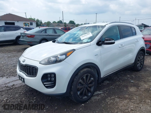 2018 Kia Sportage EX with VIN KNDPNCACXJ7409142, listed as a IAAI auction lot 42665448 with 80,537 mi miles and . Bid and sale history available at DreamBid. Image 2.