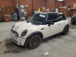 2005 MINI Hardtop with VIN WMWRC33575TK62303, listed as a Copart auction lot 61923015 with 120,563 mi miles and Salvage title. Bid and sale history available at DreamBid. Image 1.