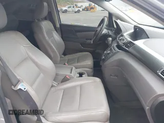 2014 Honda Odyssey LX z VIN 5FNRL5H28EB064426, wystawiony jako IAAI lot #42207634 z przebiegiem 169 706 mil mil oraz . Historia ofert i sprzedaży dostępna na DreamBid. Obrazek 5.