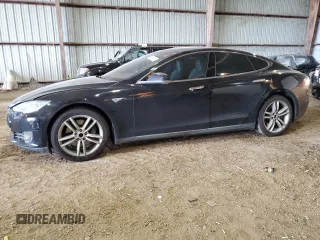 2016 Tesla Model S 70 kWh Battery with VIN 5YJSA1E1XGF129954, listed as a Copart auction lot 66937524 with 127,827 mi miles and Salvage Title. Bid and sale history available at carsss.com. Image 1.