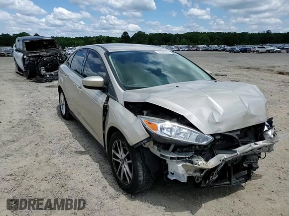 2018 Ford Focus SE z VIN 1FADP3F27JL226890, wystawiony jako Copart lot #56505085 z przebiegiem 112 865 mil mil oraz Szkoda całkowita • Salvage title. Historia ofert i sprzedaży dostępna na DreamBid. Obrazek 14.