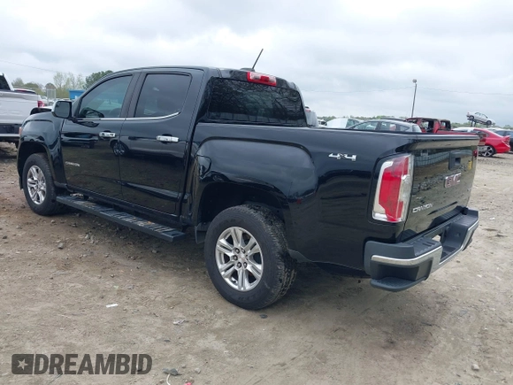 2019 GMC Canyon 4WD SLE with VIN 1GTG6CEN4K1329011, listed as a IAAI auction lot 41920100 with 82,343 mi miles. Bid and sale history available at carsss.com. Image 3.
