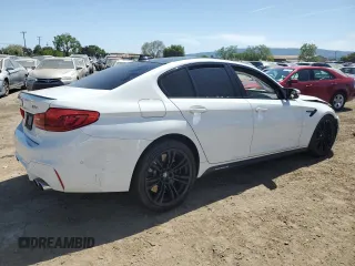 2019 BMW M5 z VIN WBSJF0C56KB446714, wystawiony jako Copart lot #52604265 z przebiegiem 63 401 mil mil oraz Szkoda całkowita • Salvage title. Historia ofert i sprzedaży dostępna na DreamBid. Obrazek 3.