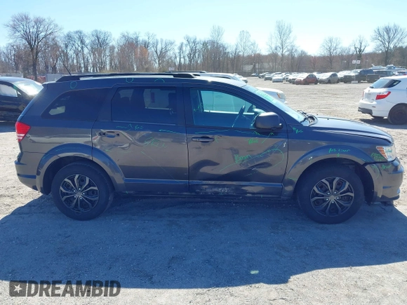 2017 Dodge Journey SE with VIN 3C4PDCAB0HT701026, listed as a IAAI auction lot 41797969 with 80,477 mi miles and . Bid and sale history available at DreamBid. Image 13.
