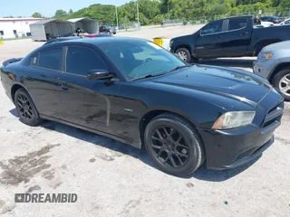 2013 Dodge Charger Police z VIN 2C3CDXAT1DH716317, wystawiony jako IAAI lot #42277270 z przebiegiem 213 722 mil mil oraz . Historia ofert i sprzedaży dostępna na DreamBid. Obrazek 1.