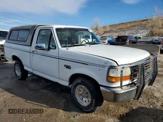 1993 Ford F-150 with VIN 1FTDF15Y4PNA36291, listed as a Copart auction lot 84710124 with 143,164 mi miles and Salvage Title. Bid and sale history available at carsss.com. Image 4.