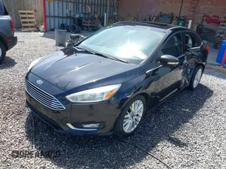 2016 Ford Focus Titanium z VIN 1FADP3J28GL393422, wystawiony jako IAAI lot #42075513 z przebiegiem 146 535 mil mil oraz . Historia ofert i sprzedaży dostępna na DreamBid. Obrazek 17.