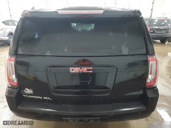 2016 GMC Yukon XL SLE with VIN 1GKS2FKCXGR105975, listed as a Copart auction lot 87233634 with 183,463 mi miles and Clean Title. Bid and sale history available at carsss.com. Image 6.