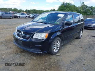2013 Dodge Grand Caravan SXT with VIN 2C4RDGCG9DR563072, listed as a IAAI auction lot 42179166 with 211,008 mi miles and . Bid and sale history available at DreamBid. Image 2.