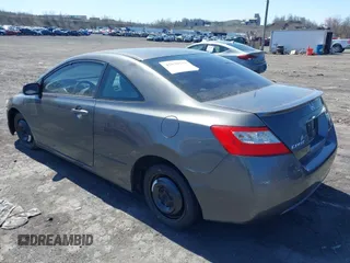 2010 Honda Civic Cpe LX with VIN 2HGFG1B63AH535237, listed as a IAAI auction lot 42070132 with 190,944 mi miles. Bid and sale history available at carsss.com. Image 3.