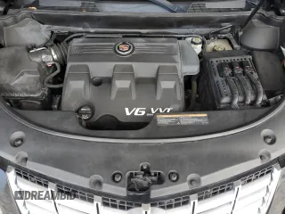 2015 Cadillac SRX Premium Collection z VIN 3GYFNDE38FS596718, wystawiony jako Copart lot #56674245 z przebiegiem 106 379 mil mil oraz Szkody całkowita. Historia ofert i sprzedaży dostępna na DreamBid. Obrazek 12.