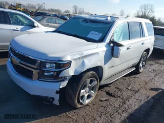 2020 Chevrolet Tahoe LT with VIN 1GNSKBKC1LR290889, listed as a IAAI auction lot 41492821 with 107,843 mi miles. Bid and sale history available at carsss.com. Image 2.