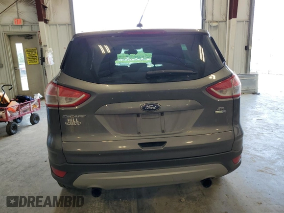 2013 Ford Escape SE with VIN 1FMCU9G94DUB70706, listed as a Copart auction lot 61373675 with 88,221 mi miles and Non repairable. Bid and sale history available at DreamBid. Image 6.
