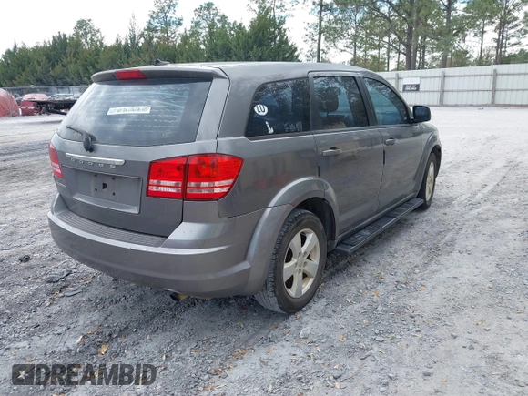 2013 Dodge Journey SE z VIN 3C4PDCAB2DT577805, wystawiony jako IAAI lot #41674351 z przebiegiem 183 006 mil mil oraz . Historia ofert i sprzedaży dostępna na DreamBid. Obrazek 4.