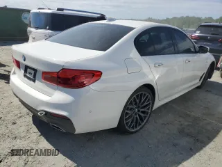 2018 BMW 5 Series 540i xDrive with VIN WBAJE7C52JG891212, listed as a Copart auction lot 58119195 with 73,770 mi miles and Salvage title. Bid and sale history available at DreamBid. Image 3.