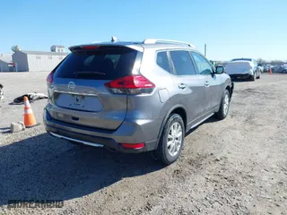 2017 Nissan Rogue S with VIN KNMAT2MV7HP509440, listed as a IAAI auction lot 41869334 with 150,484 mi miles. Bid and sale history available at carsss.com. Image 4.