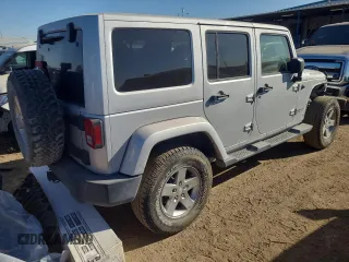 2012 Jeep Wrangler Unlimited Call of Duty MW3 с VIN 1C4BJWFG3CL103865, выставлен на аукционе Copart как лот 74237754 с пробегом 104 232 миль миль и Списание • Salvage title. История ставок и продаж доступна на DreamBid. Изображение 3.