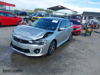 2017 Mitsubishi Lancer ES with VIN JA32V2FW9HU000485, listed as a IAAI auction lot 42019371 with 101,922 mi miles. Bid and sale history available at carsss.com. Image 2.