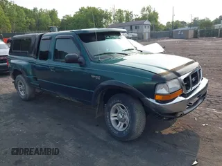 2000 Ford Ranger XLT z VIN 1FTZR15X7YTA93621, wystawiony jako IAAI lot #42457950 z przebiegiem 88 321 mil mil oraz . Historia ofert i sprzedaży dostępna na DreamBid. Obrazek 1.