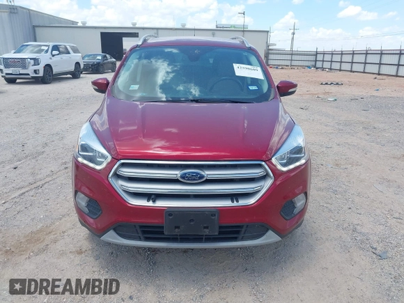 2018 Ford Escape Titanium with VIN 1FMCU0J96JUD58854, listed as a IAAI auction lot 42590609 with 77,825 mi miles and . Bid and sale history available at DreamBid. Image 12.