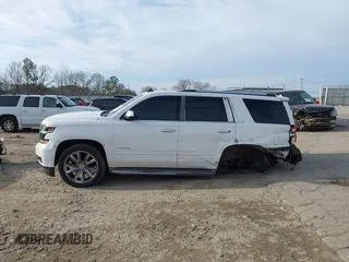 2015 Chevrolet Tahoe LTZ z VIN 1GNSKCKC5FR177134, wystawiony jako IAAI lot #41460583 z przebiegiem 202 924 mil mil oraz . Historia ofert i sprzedaży dostępna na DreamBid. Obrazek 14.