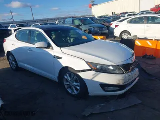 2013 Kia Optima EX with VIN 5XXGN4A79DG199153, listed as a IAAI auction lot 41737349 with 135,000 mi miles. Bid and sale history available at carsss.com. Image 1.