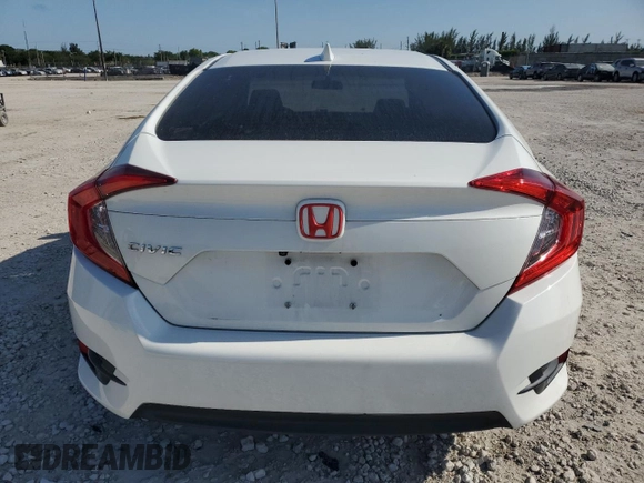 2018 Honda Civic EX с VIN 19XFC2F78JE037033, выставлен на аукционе Copart как лот 57363035 с пробегом 44 820 миль миль и Списание • Salvage title. История ставок и продаж доступна на DreamBid. Изображение 6.