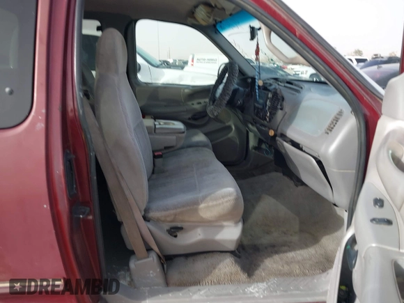 1998 Ford F-150 with VIN 1FTZX17WXWKB63416, listed as a IAAI auction lot 41604048 with 214,890 mi miles and . Bid and sale history available at DreamBid. Image 5.