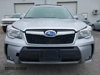 2014 Subaru Forester XT Touring with VIN JF2SJGMC1EH552474, listed as a IAAI auction lot 42461663 with 121,482 mi miles and . Bid and sale history available at DreamBid. Image 6.