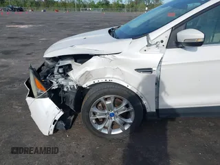 2013 Ford Escape SEL with VIN 1FMCU9H99DUA97959, listed as a IAAI auction lot 41879967 with 149,456 mi miles. Bid and sale history available at carsss.com. Image 6.