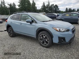 2020 Subaru Crosstrek Premium with VIN JF2GTAPC5L8243550, listed as a Copart auction lot 59637725 with 76,627 mi miles and Salvage title. Bid and sale history available at DreamBid. Image 4.