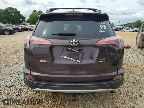 2016 Toyota RAV4 XLE with VIN 2T3RFREV9GW516247, listed as a Copart auction lot 56342505 with 105,718 mi miles and Salvage title. Bid and sale history available at DreamBid. Image 6.