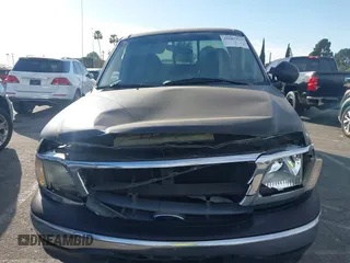 2000 Ford F-150 XL with VIN 1FTRX17L2YNB78032, listed as a IAAI auction lot 41687215 with 1 mi miles. Bid and sale history available at carsss.com. Image 11.