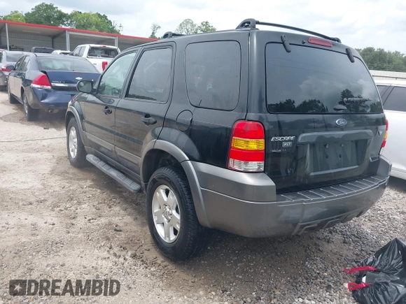 2006 Ford Escape XLT with VIN 1FMYU03156KA84031, listed as a IAAI auction lot 42276336 with 136,038 mi miles and . Bid and sale history available at DreamBid. Image 3.