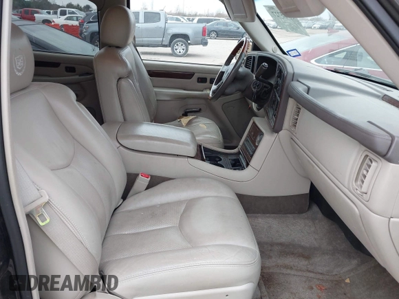 2003 Cadillac Escalade z VIN 1GYEC63T43R206146, wystawiony jako IAAI lot #41335727 z przebiegiem Nie podano mil oraz . Historia ofert i sprzedaży dostępna na DreamBid. Obrazek 5.