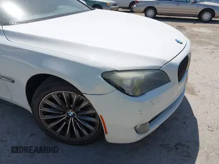 2012 BMW 7 Series 750Li z VIN WBAKB8C52CC963233, wystawiony jako IAAI lot #42332082 z przebiegiem 150 319 mil mil oraz . Historia ofert i sprzedaży dostępna na DreamBid. Obrazek 6.